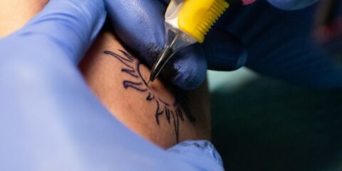 A person is getting tattooed.