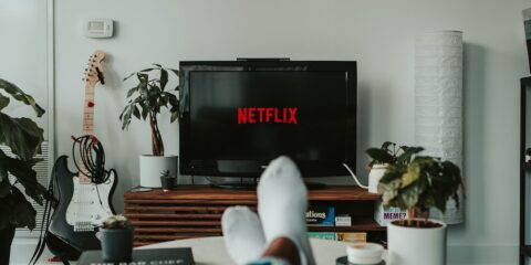 black flat screen tv turned on displaying 11