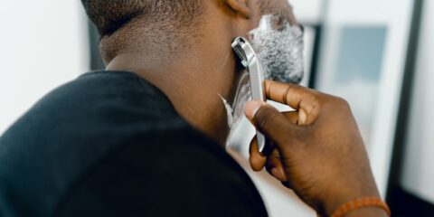 man shaving himself