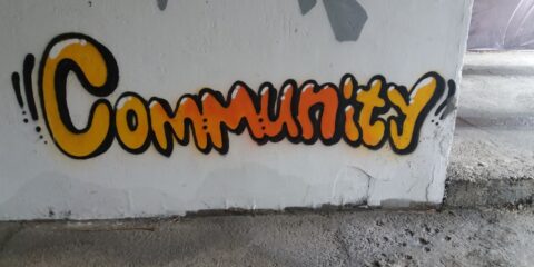 a wall that has some graffiti on it