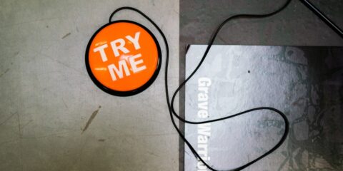 a picture of a tag that says try me on it