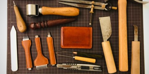 a variety of tools laid out on a cutting board