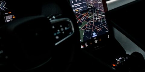 the dashboard of a car with a gps device