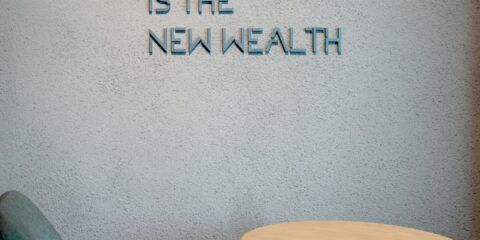 Health is the new wealth, shown near a chair.