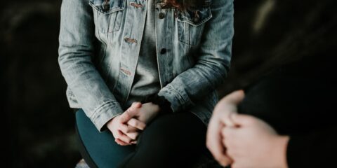 woman wearing gray jacket