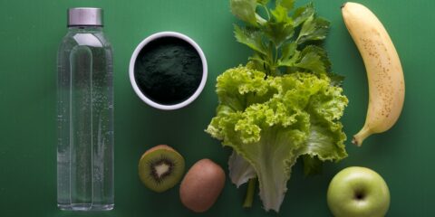 assorted fruits and vegetables on green surface