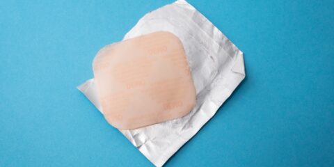 square brown tissue and white paper pack