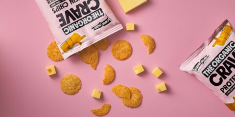 a bag of cheese crackers next to a bag of crackers