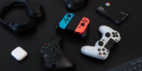$100+ National Online Study About Gaming Consoles white and orange game controller