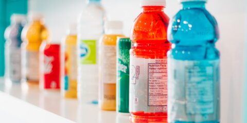 green and white labeled bottles