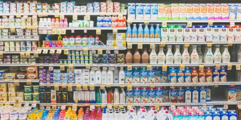 assorted drinks on white commercial refrigerator