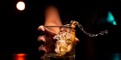 clear drinking glass with ice cubes