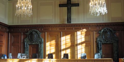 Virtual Interview – Mock Trial (West Odessa, TX) – Earn $300 black cross on brown wooden table