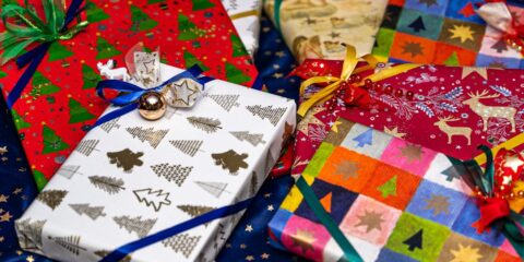 Virtual Interview – Christmas Shop-a-long (Nationwide) – Earn $150 a group of wrapped presents sitting on top of a table