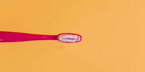 Unmoderated Task – Tooth Care Habits (Nationwide) – Earn $28 pink and yellow toothbrush on orange background